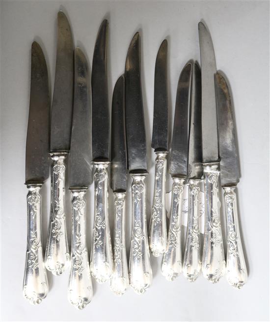 A set of six 19th century French silver handled table knives and five dessert knives.